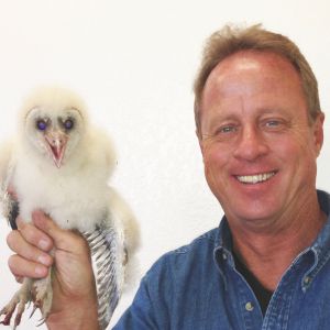 Marc holding an owl. 