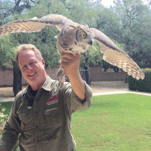 Marc holding an owl.